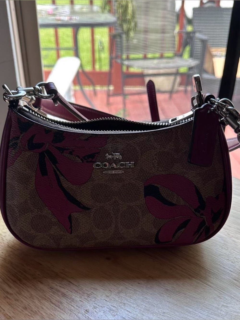 COACH Brown Signature Shoulder Bag with Pink Bow Accents